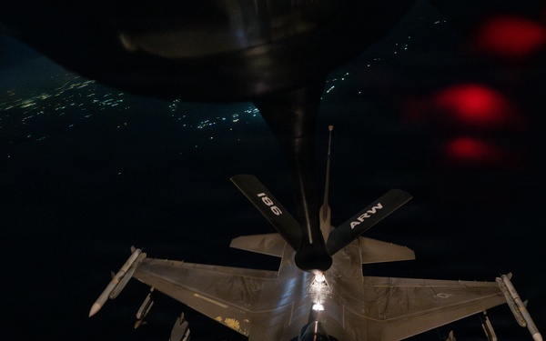 KC-135 refuels F-16s for regional deterrence