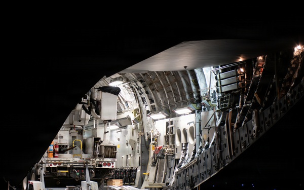 15th Wing airlifts California utility trucks from Hilo to Lihue for Hurricane Lowell recovery