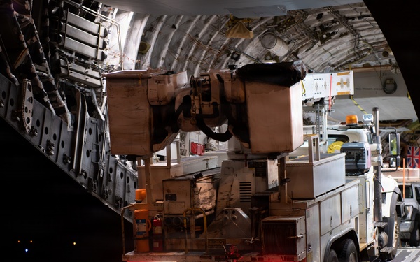 15th Wing airlifts California utility trucks from Hilo to Lihue for Hurricane Lowell recovery