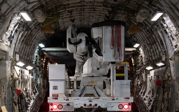 15th Wing airlifts California utility trucks from Hilo to Lihue for Hurricane Lowell recovery
