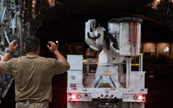 15th Wing airlifts California utility trucks from Hilo to Lihue for Hurricane Lowell recovery