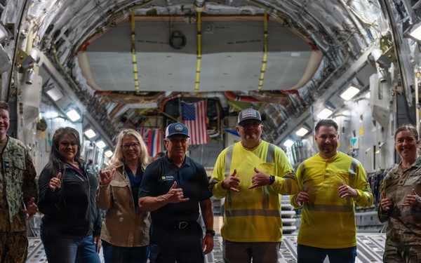 15th Wing airlifts California utility trucks from Hilo to Lihue for Hurricane Lowell recovery