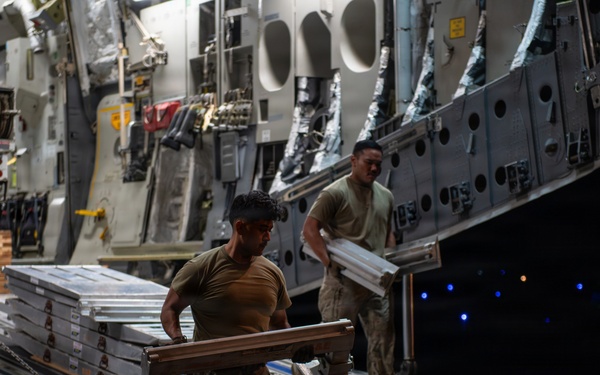 15th Wing airlifts California utility trucks from Hilo to Lihue for Hurricane Lowell recovery