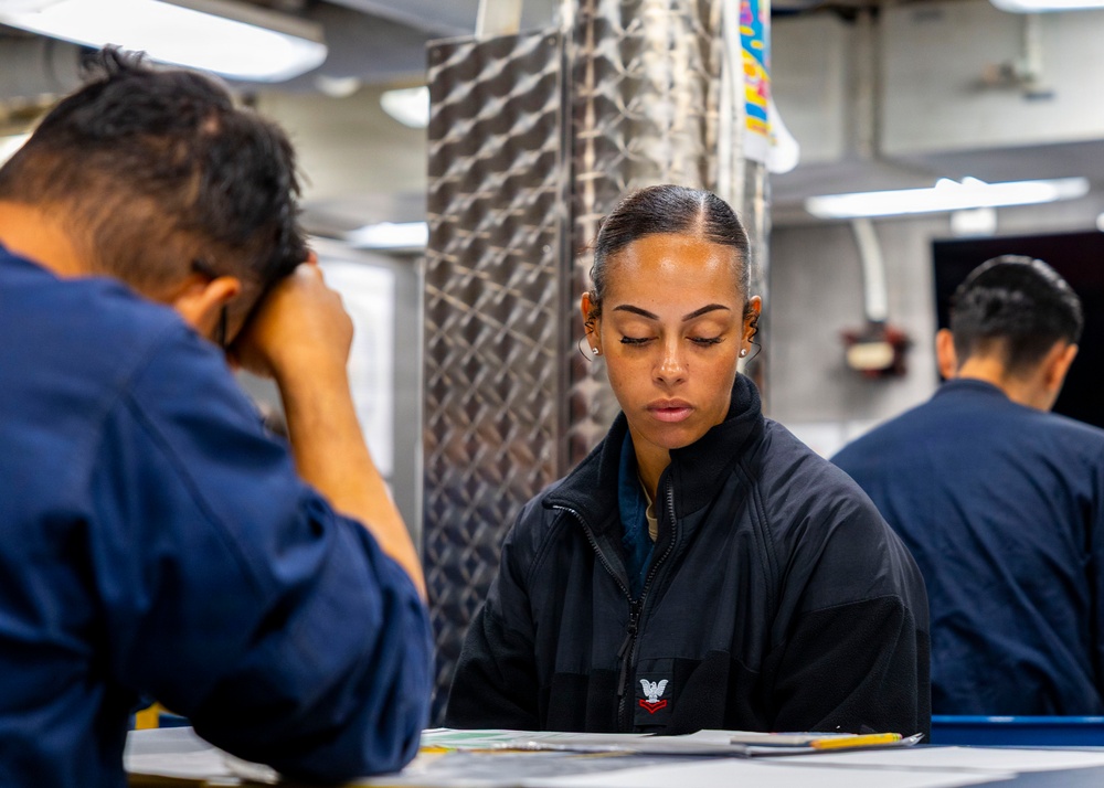 USS Benfold Sailors take the Rating-Knowledge Exam at Sea