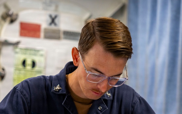 USS Benfold Sailors take the Rating-Knowledge Exam at Sea