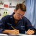 USS Benfold Sailors take the Rating-Knowledge Exam at Sea