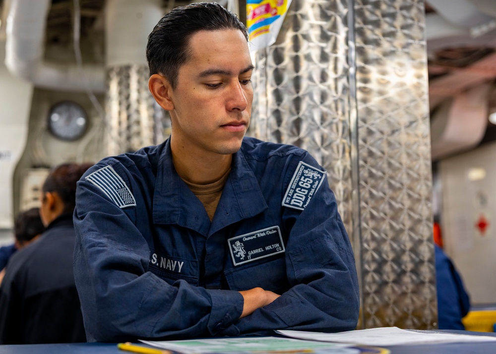 USS Benfold Sailors take the Rating-Knowledge Exam at Sea