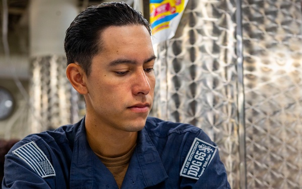 USS Benfold Sailors take the Rating-Knowledge Exam at Sea