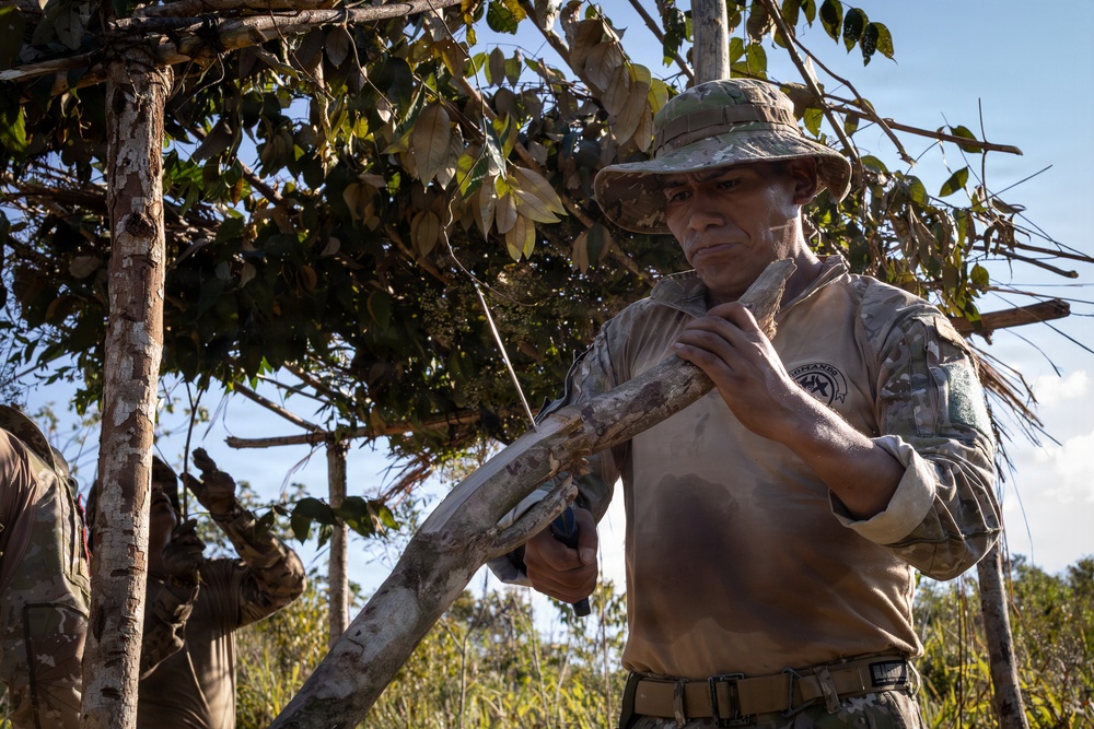 Peruvian Soldier Builds A Primitive Shelter During SV26