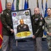 A military ceremony honoring U.S. Army Brigadier General Theodore R. Scott III, with three service members posing with a commemorative framed photo collage. The framed piece displays the dates '01 APR 1986 - 31 AUG 2026' and the motto 'Support the Fight,' along with the Georgia Army National Guard insignia. The ceremony appears to be a retirement or farewell event held in a formal military setting.