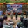 U.S. Marines and Thailand Mine Action Center participate in Deployed for Training Bilateral EOD Exercise A formal military ceremony is taking place at the 'Deploy for Training Bi-Lateral EOD Exercise' held between August 14 and September 4, 2026, at the 2nd Army Area Tactical Training Ground (Phu Lam Yai Training Ground) in Nakhon Ratchasima Province, Thailand. The event involves both U.S. and Thai military personnel standing on a stage before an audience rendering salutes. The backdrop features Thai and American flags along with unit insignia, decorated with red and yellow bunting on camouflage netting.