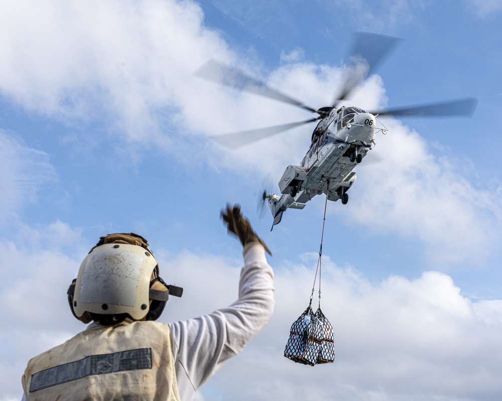 USS Mustin conducts vertical replenishment-at-sea with USNS Cesar Chavez