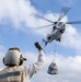 USS Mustin conducts vertical replenishment-at-sea with USNS Cesar Chavez
