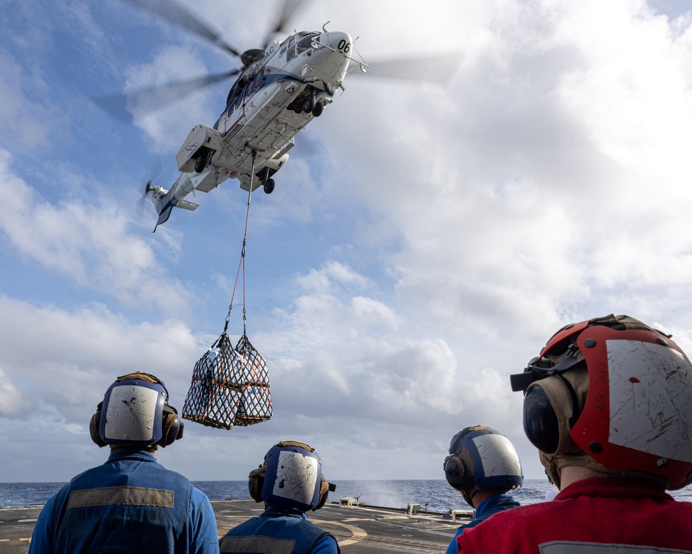 USS Mustin conducts vertical replenishment-at-sea with USNS Cesar Chavez