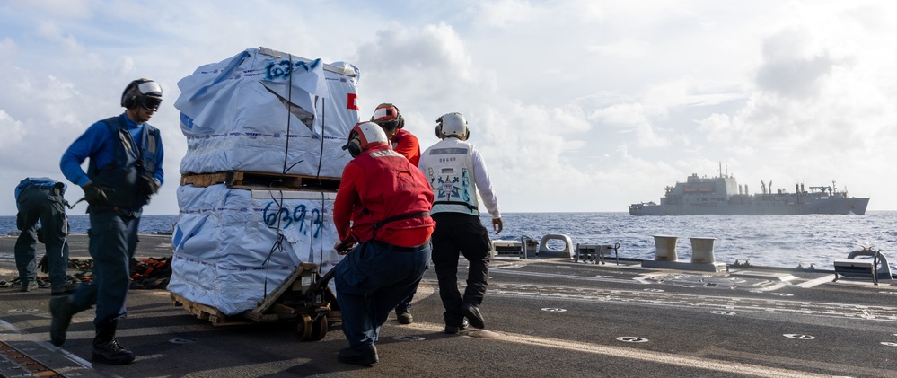 USS Mustin conducts vertical replenishment-at-sea with USNS Cesar Chavez