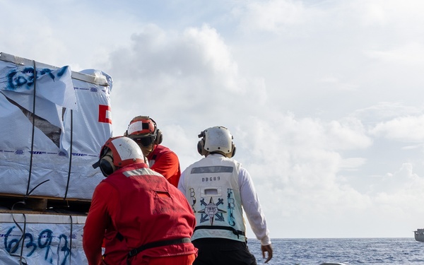 USS Mustin conducts vertical replenishment-at-sea with USNS Cesar Chavez