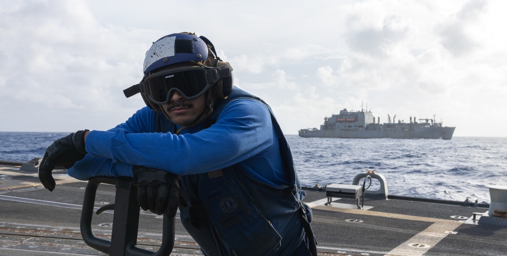 USS Mustin conducts vertical replenishment-at-sea with USNS Cesar Chavez