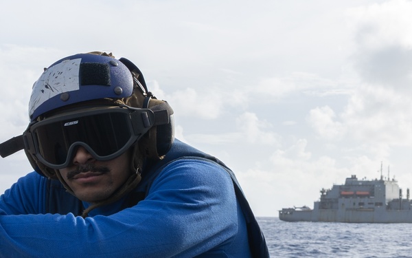USS Mustin conducts vertical replenishment-at-sea with USNS Cesar Chavez