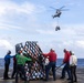 USS Mustin conducts vertical replenishment-at-sea with USNS Cesar Chavez