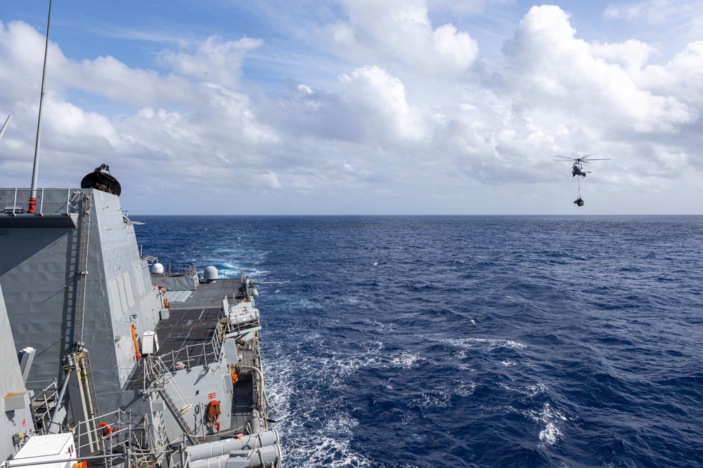 USS Mustin conducts vertical replenishment-at-sea with USNS Cesar Chavez