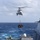 USS Mustin conducts vertical replenishment-at-sea with USNS Cesar Chavez USS Mustin conducts vertical replenishment-at-sea with USNS Cesar Chavez