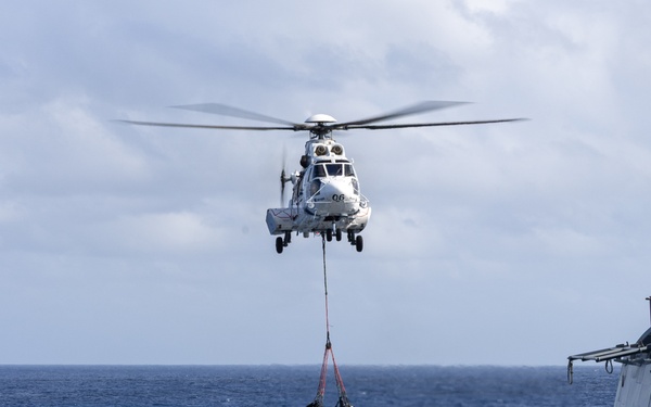 USS Mustin conducts vertical replenishment-at-sea with USNS Cesar Chavez