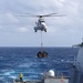 USS Mustin conducts vertical replenishment-at-sea with USNS Cesar Chavez
