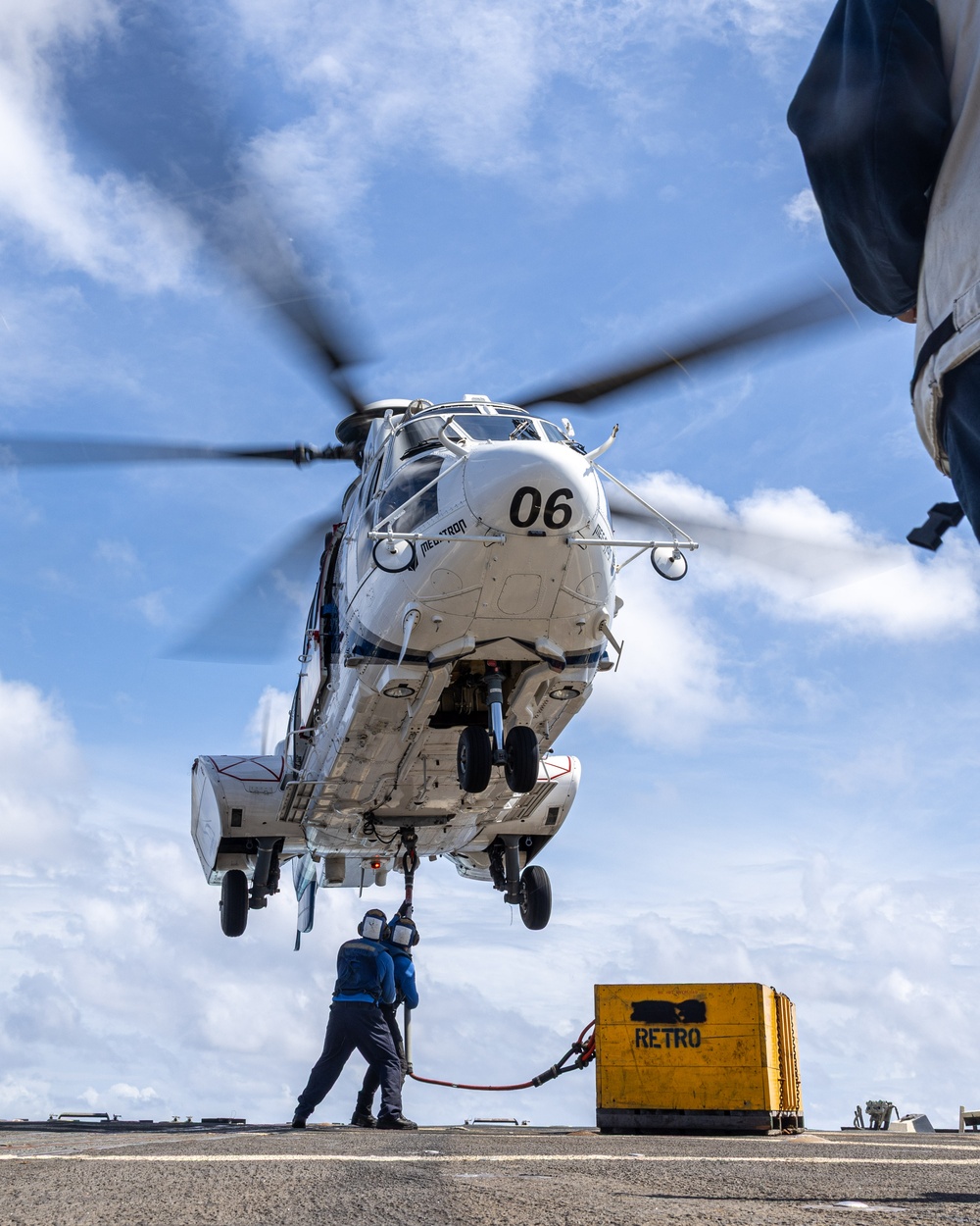 USS Mustin conducts vertical replenishment-at-sea with USNS Cesar Chavez