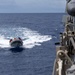 USS Mustin conducts boats operations
