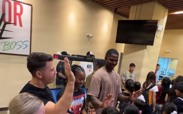 Bonding Beyond the Uniform: Children, Soldiers Create Lasting Memories