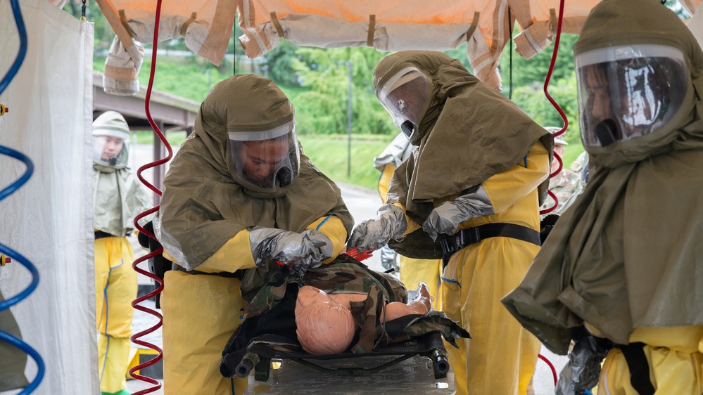 Osan Airmen strengthen readiness through decontamination training