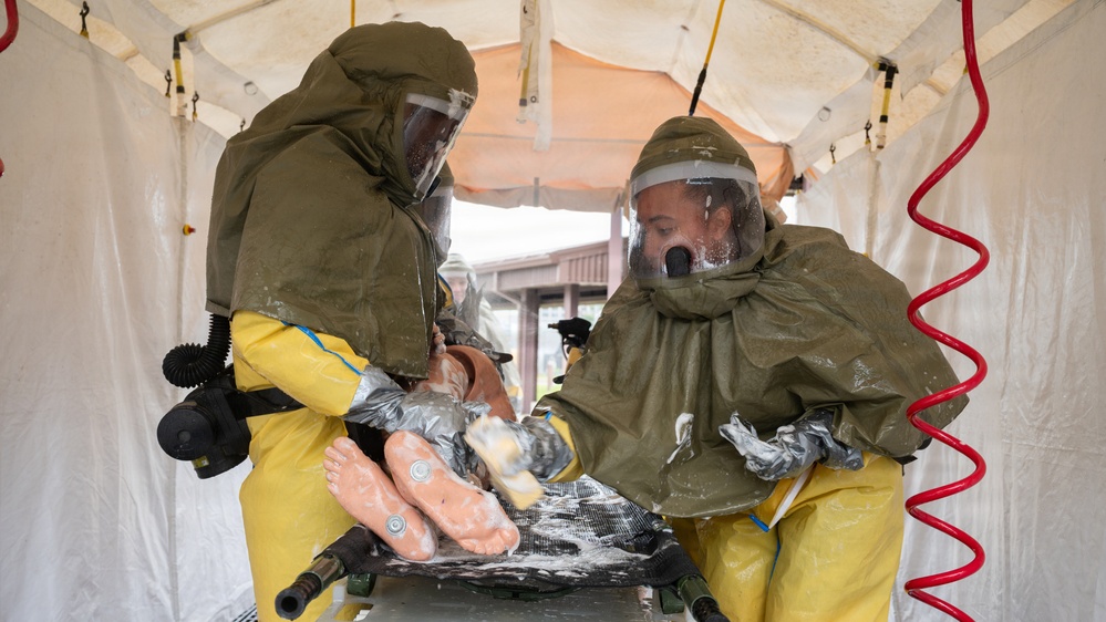 Osan Airmen strengthen readiness through decontamination training