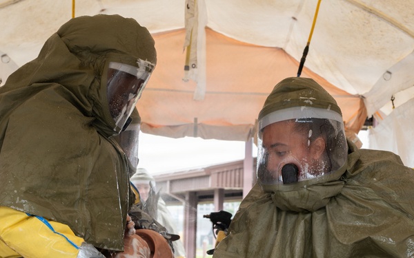 Osan Airmen strengthen readiness through decontamination training