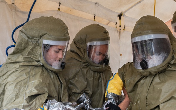 Osan Airmen strengthen readiness through decontamination training