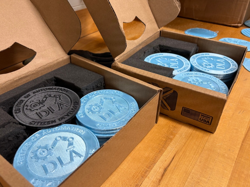 Product Test Center Analytics engineers placed completed coasters in their boxes