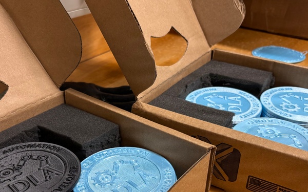 Product Test Center Analytics engineers placed completed coasters in their boxes