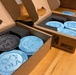 Product Test Center Analytics engineers placed completed coasters in their boxes