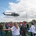 5th Bomb Wing Leadership delivers the game ball for the Prairie Warrior Bowl Military Appreciation game