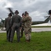 5th Bomb Wing Leadership delivers the game ball for the Prairie Warrior Bowl Military Appreciation game