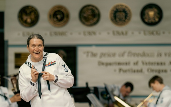 Musician 2nd Class Carrie Blosser addresses audience at the Portland Veterans Affairs Hospital
