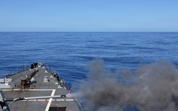 USS Carl M. Levin conducts a live-fire training exercise