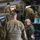 Polish General Piotr Trytek Strengthens Alliance During 12th CAB Visit Military personnel in a hangar are performing maintenance or inspection on what appears to be a helicopter. A mix of soldiers wearing US Army OCP (Operational Camouflage Pattern) uniforms and at least one soldier wearing a Polish military uniform with a visible Polish flag patch are gathered around the aircraft. Some personnel are working on top of or inside the aircraft while others appear to be in discussion.