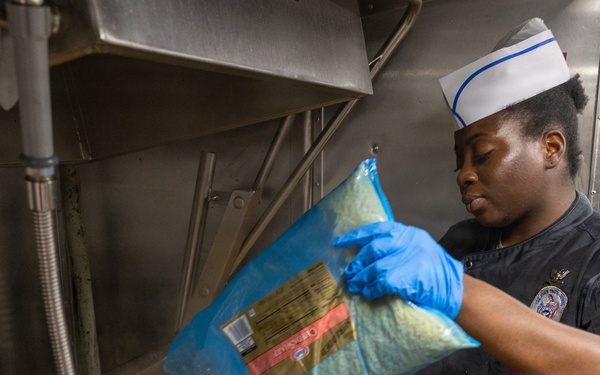 John Paul Jones Sailor Prepares Meal