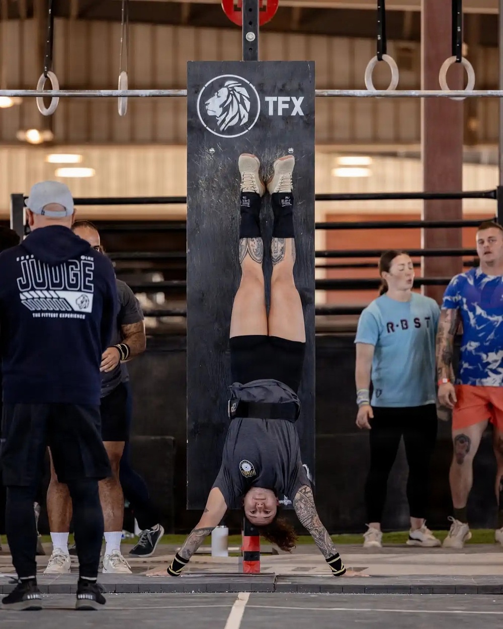 Sgt. 1st Class Samantha Lamirand Competes in a Wall Walk Event at Fittest Experience