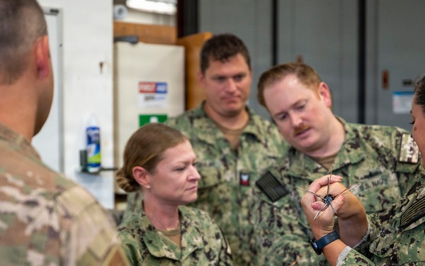 934th Civil Engineer Squadron trains with U.S. Navy reservist