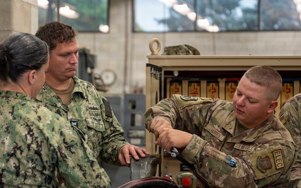 934th Civil Engineer Squadron trains with U.S. Navy reservist