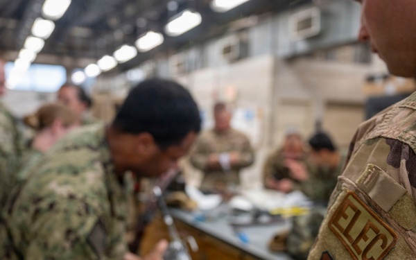934th Civil Engineer Squadron trains with U.S. Navy reservist