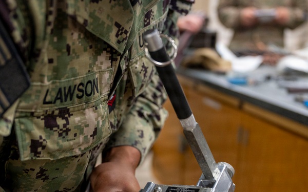 934th Civil Engineer Squadron trains with U.S. Navy reservist
