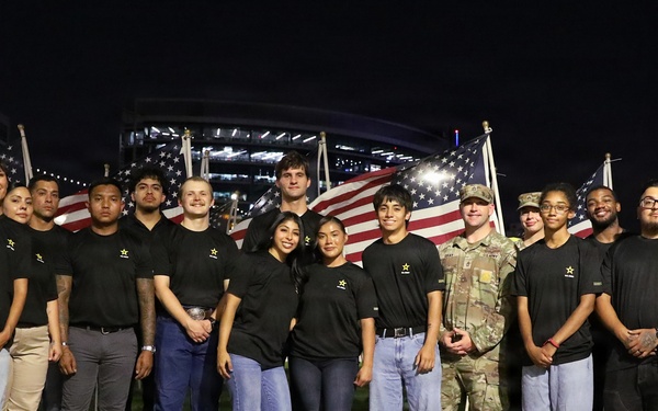 U.S. Army recruiters and future Soldiers pose for group photo at 9/11 memorial