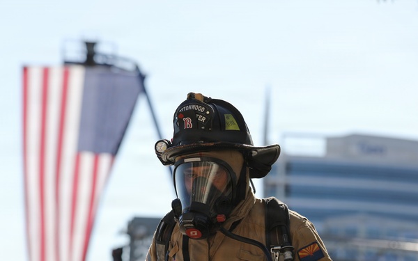 Firefighter runs the Tunnel to Towers 5k 9/11 memorial event
